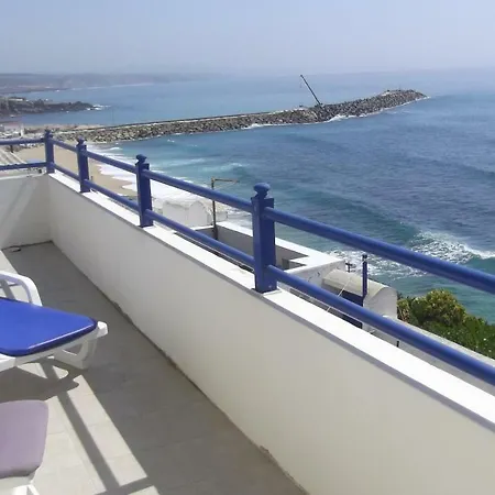 Cliff House Next To Apartment